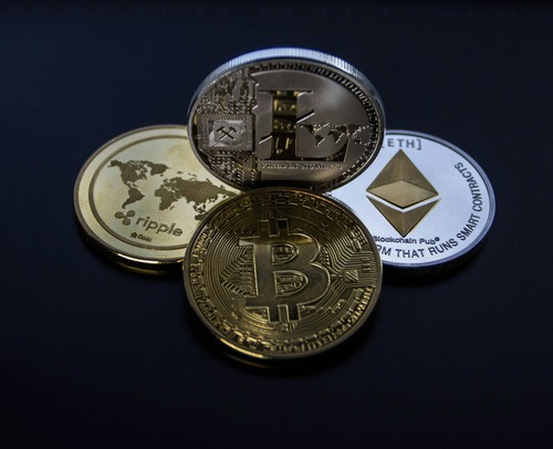 Physical Bitcoin coin representing the satoshi unit smallest Bitcoin denomination